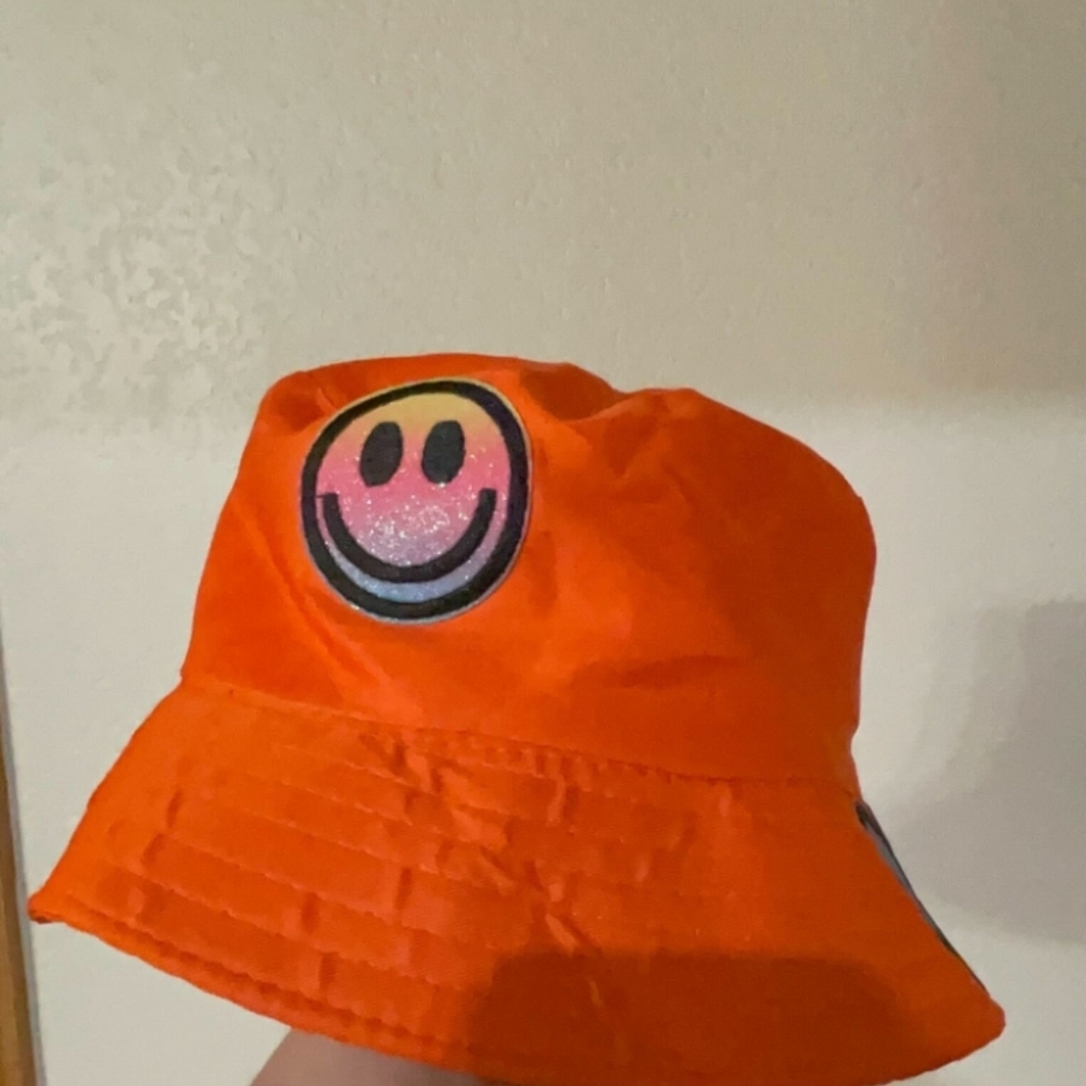 Cheerful Orange Smiley Face Bucket Hat